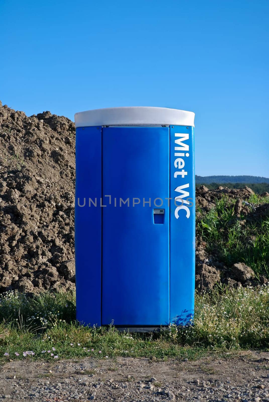 Blue mobile toilet