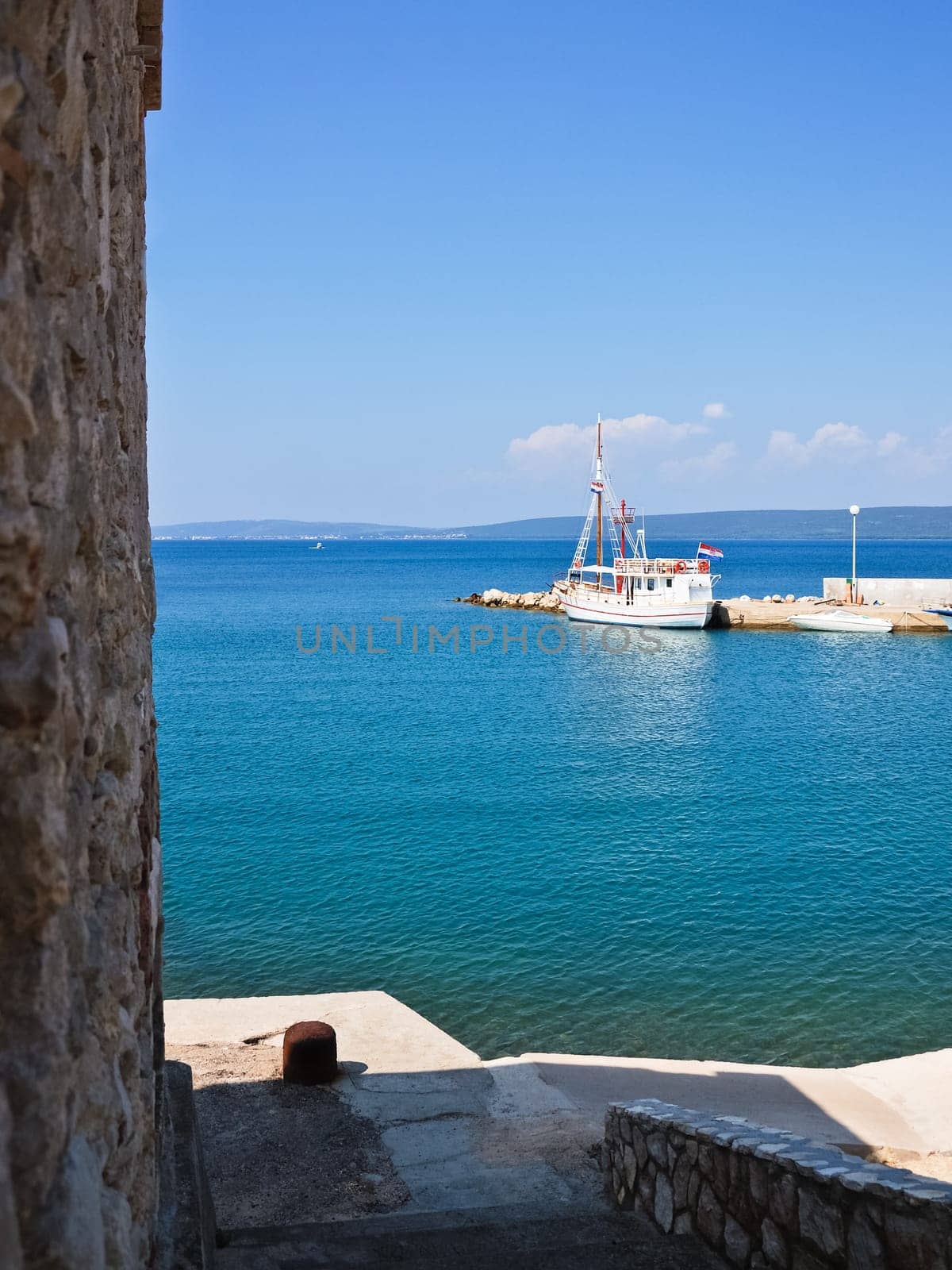 Fishing boat in the quiet harbour