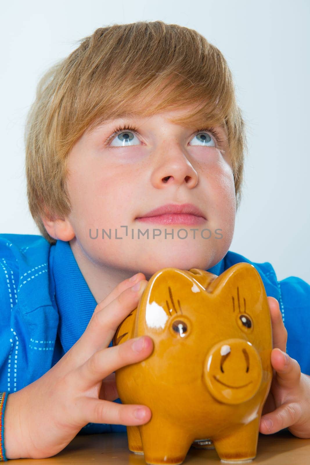boy and his piggybank