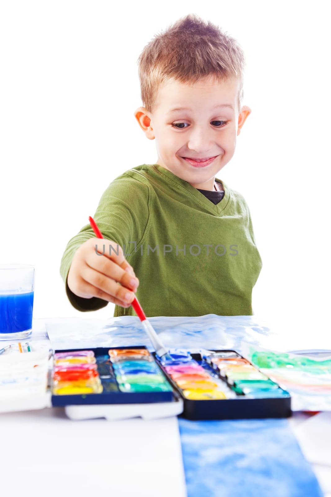 Casual schooboy painting with watercolor on white background