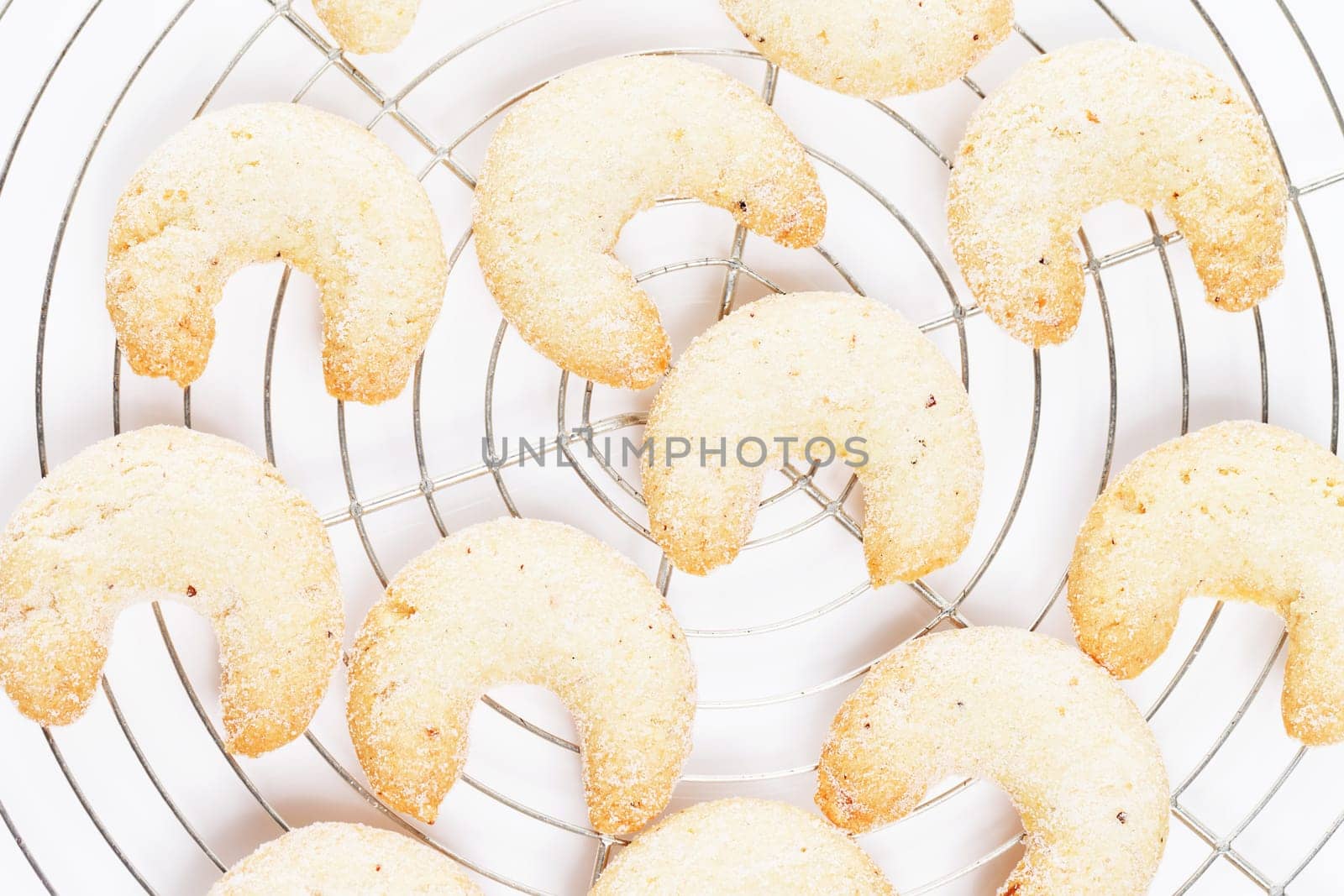 Vanilla crescents on cake rack for Christmas from above