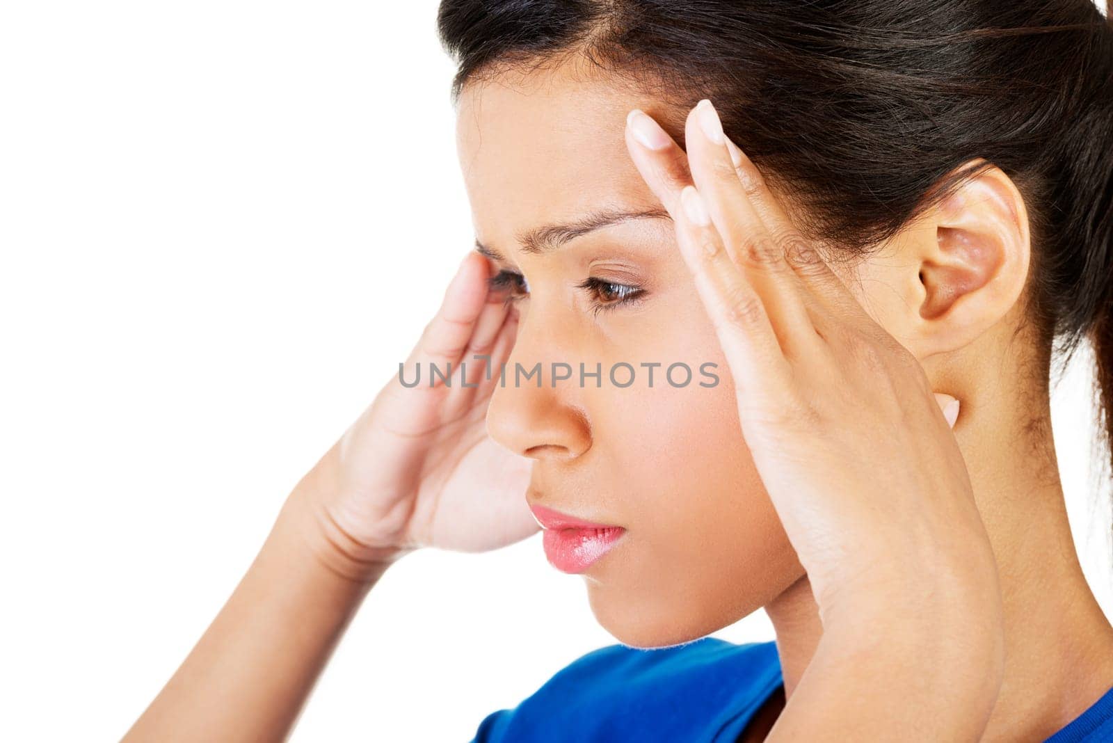 Woman with headache or problem holding her hand to the head