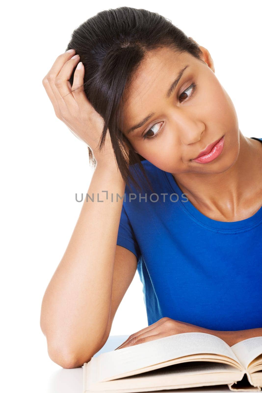 Woman studying at the desk being tired, isolated on white