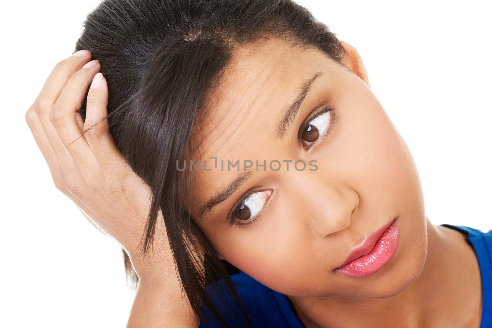 Young beautiful woman in depression. Isolated on white background.