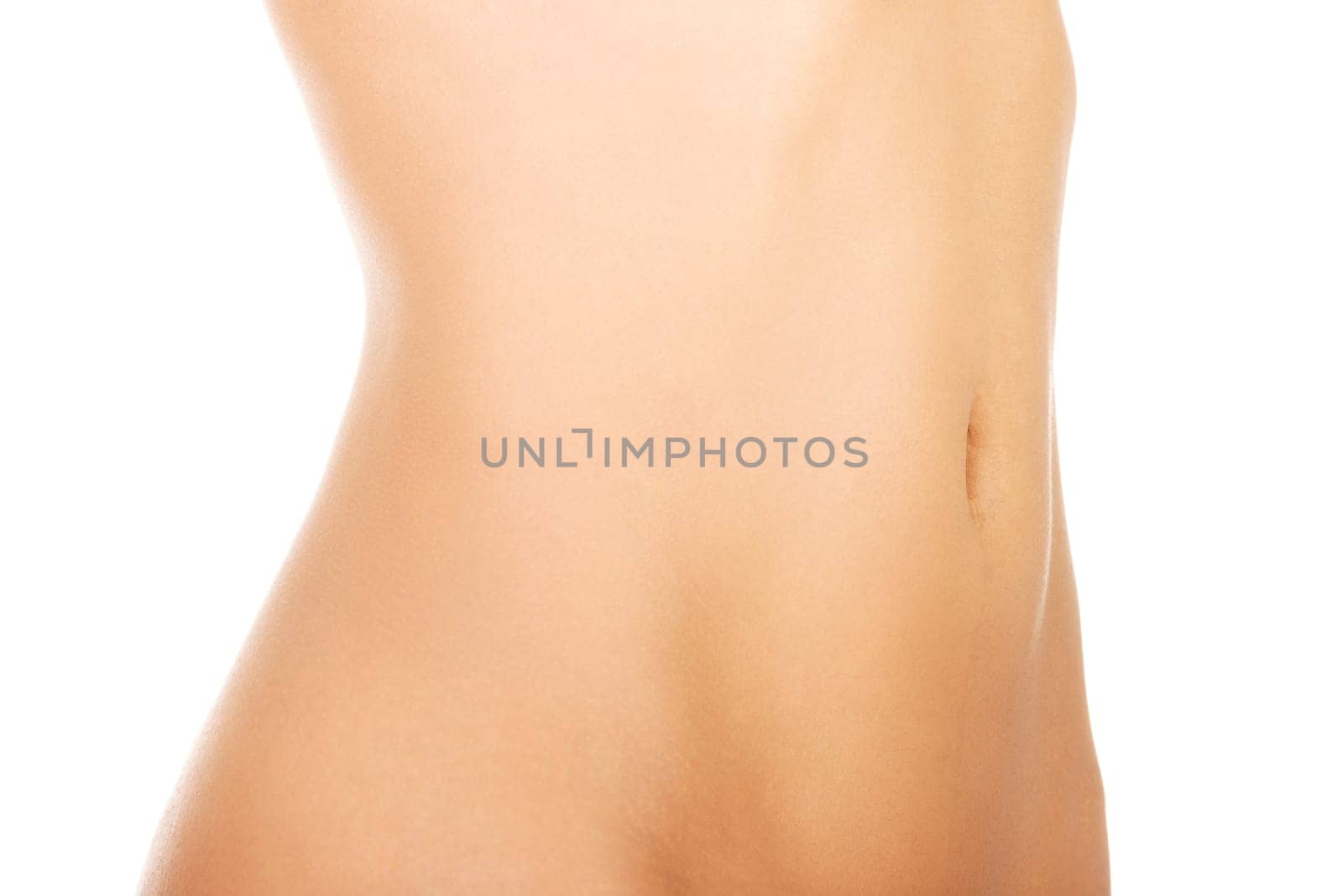 Close up of perfect nude body of young fit woman, isolated on white