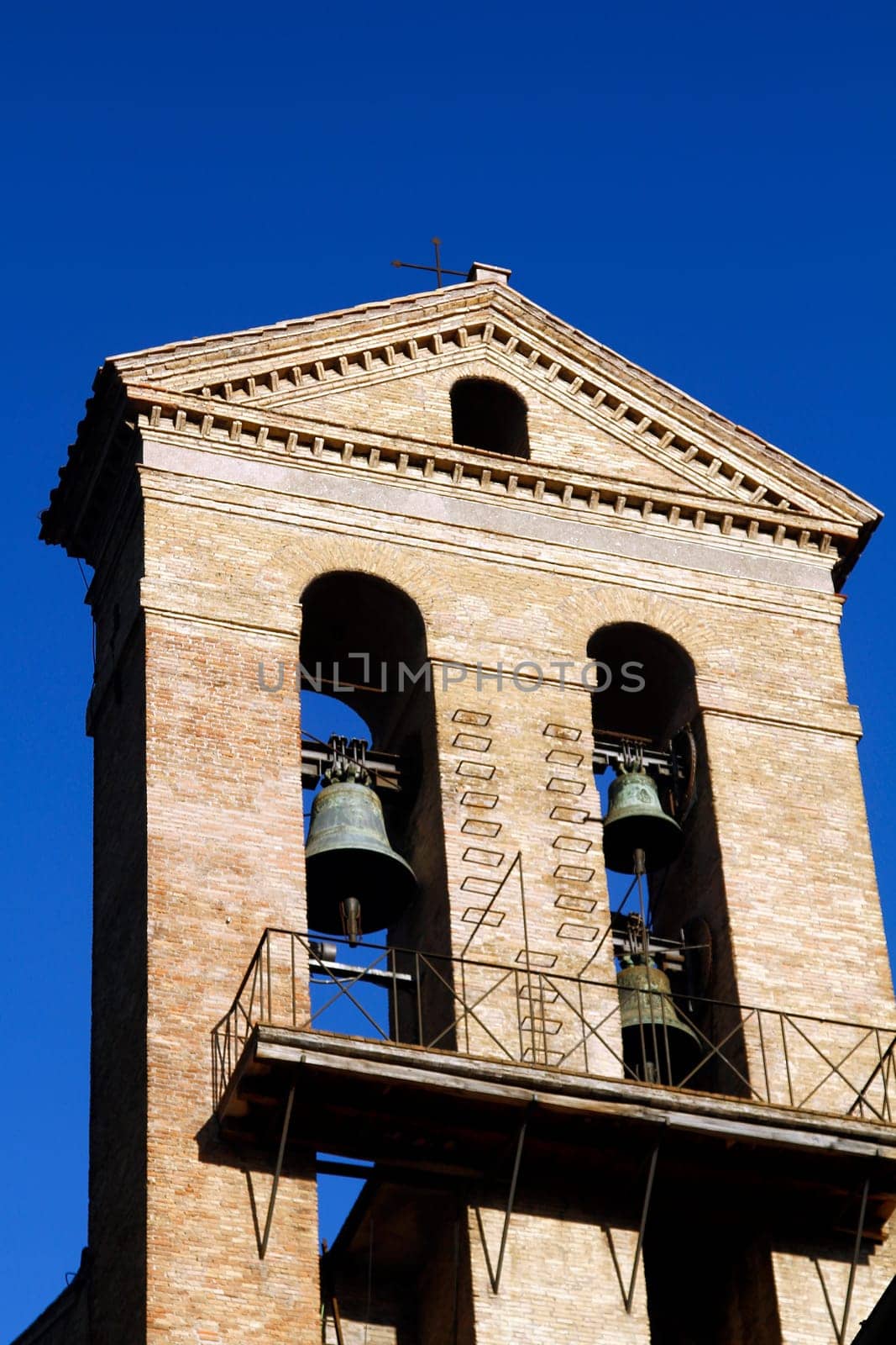 Bell tower detail  in the exterior of the Basilica of St. Mary of the Altar of Heaven located in Rome, Italy.