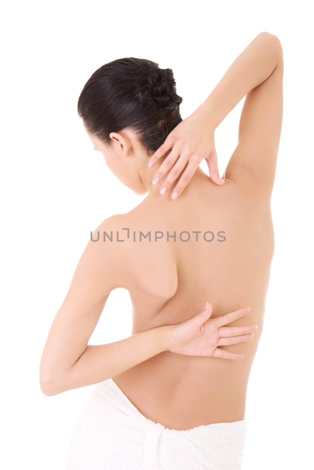 Young beautiful nude woman with towel , isolated on white