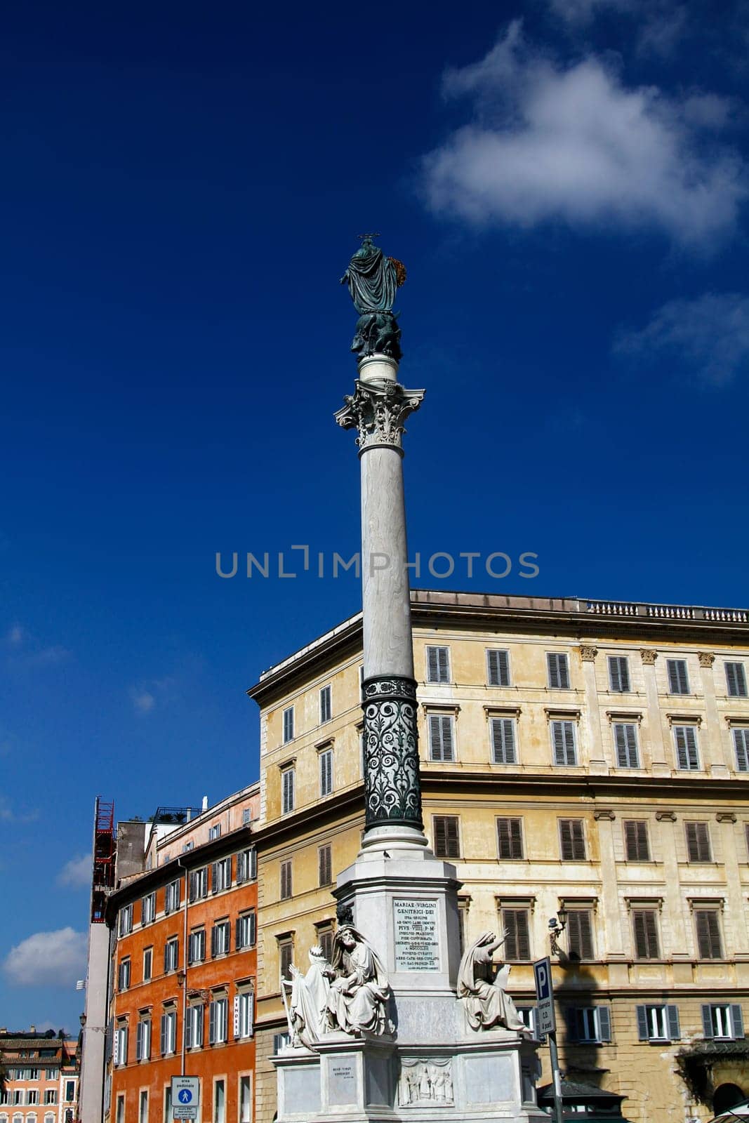 View in center, the Column of the Immaculate Conception, located in Rome, Italy, near the Piazza di Spagna.