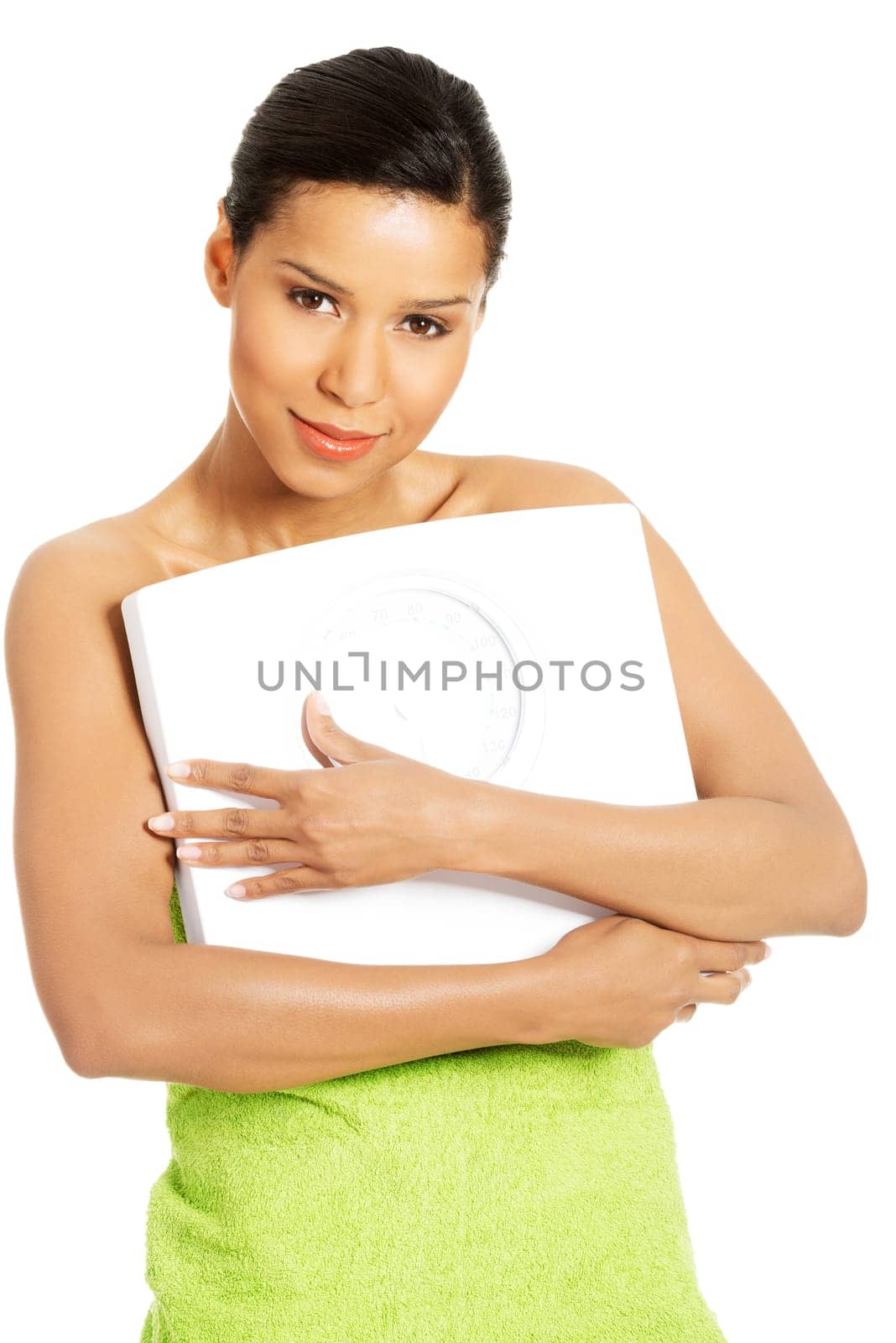 Happy woman with scale. Weight-loss concept.