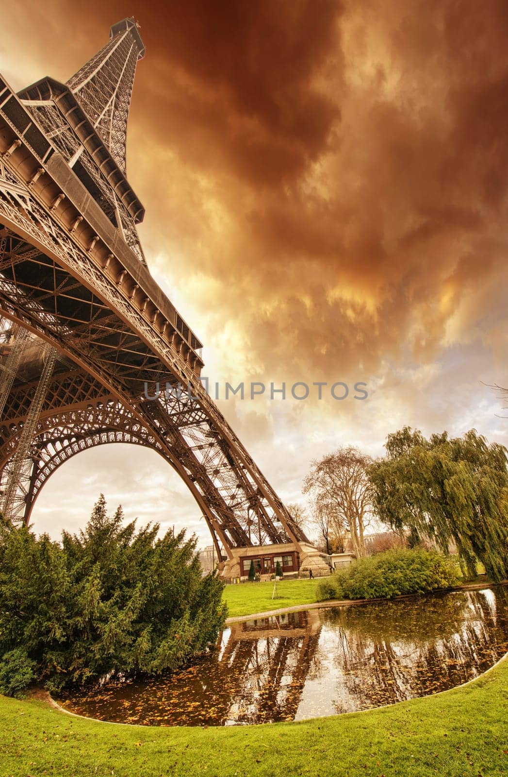 Beautiful sunset colors of Eiffel Tower with its magnificence - Paris.