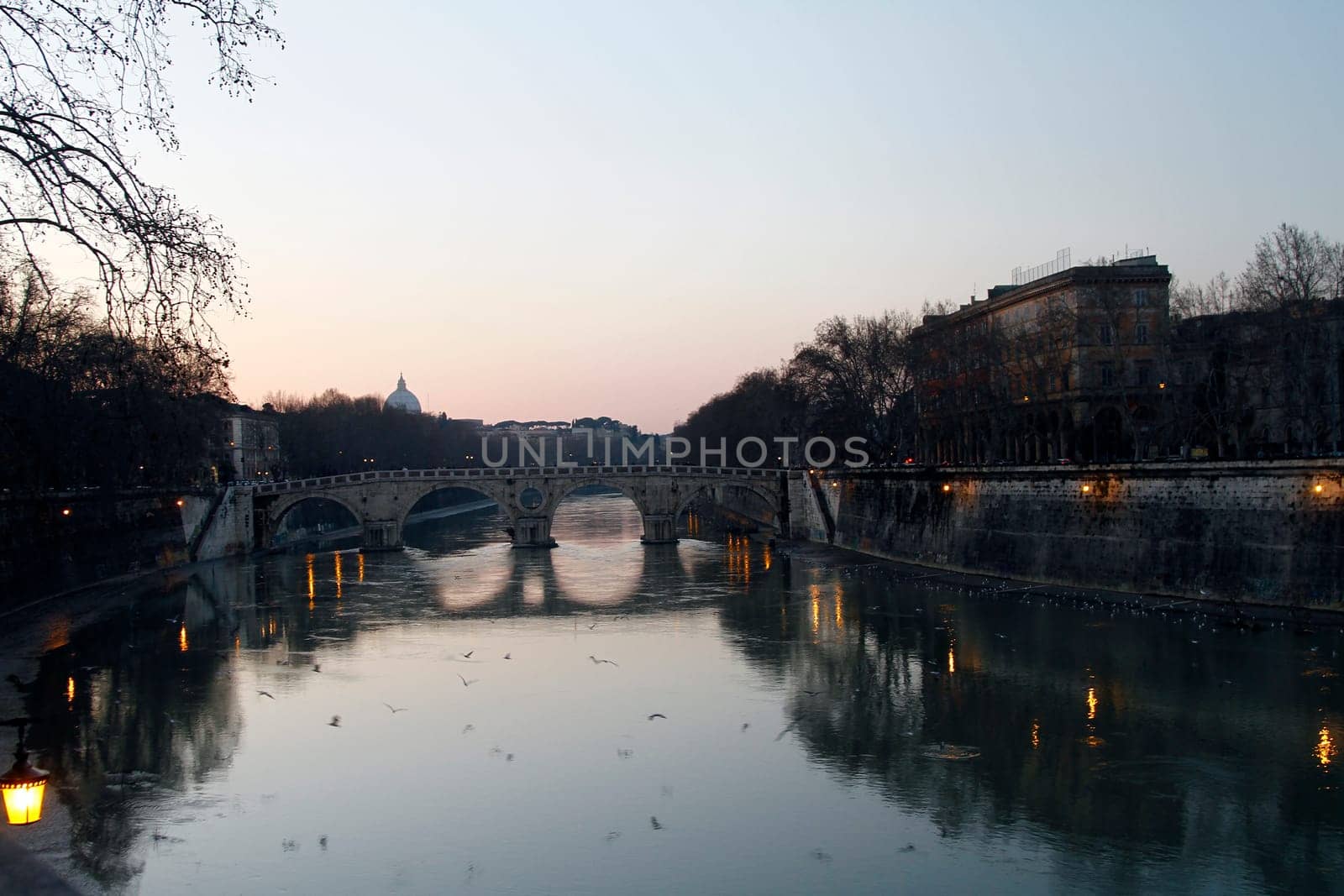 Wide view of the bridges over river Tiber in Rome, Italy.