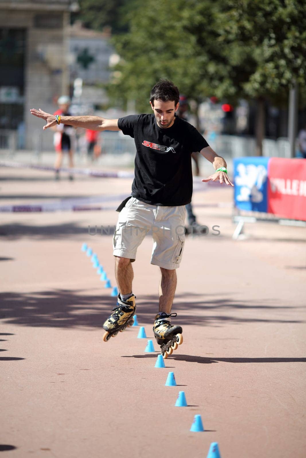 Lyon, France. September 22, 2013. Detail of a cession of exhibition of freestyle slalom in roller inline..