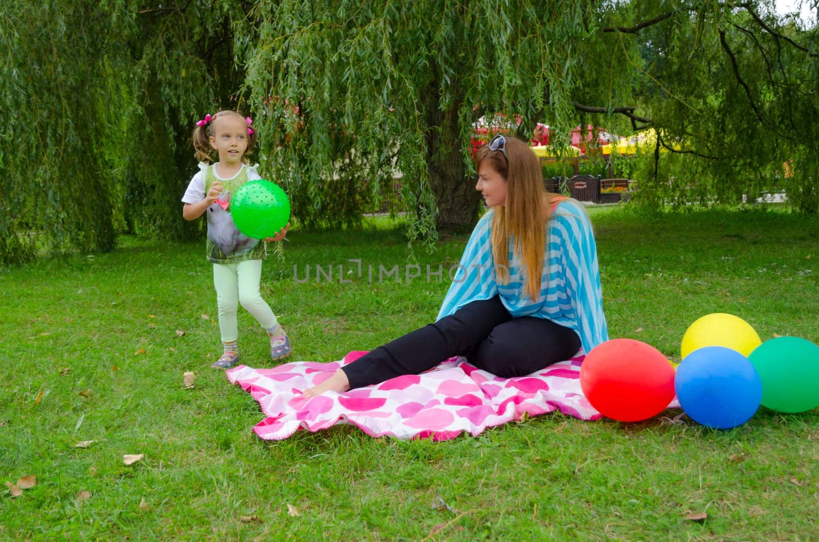 small girls with aerial balloon