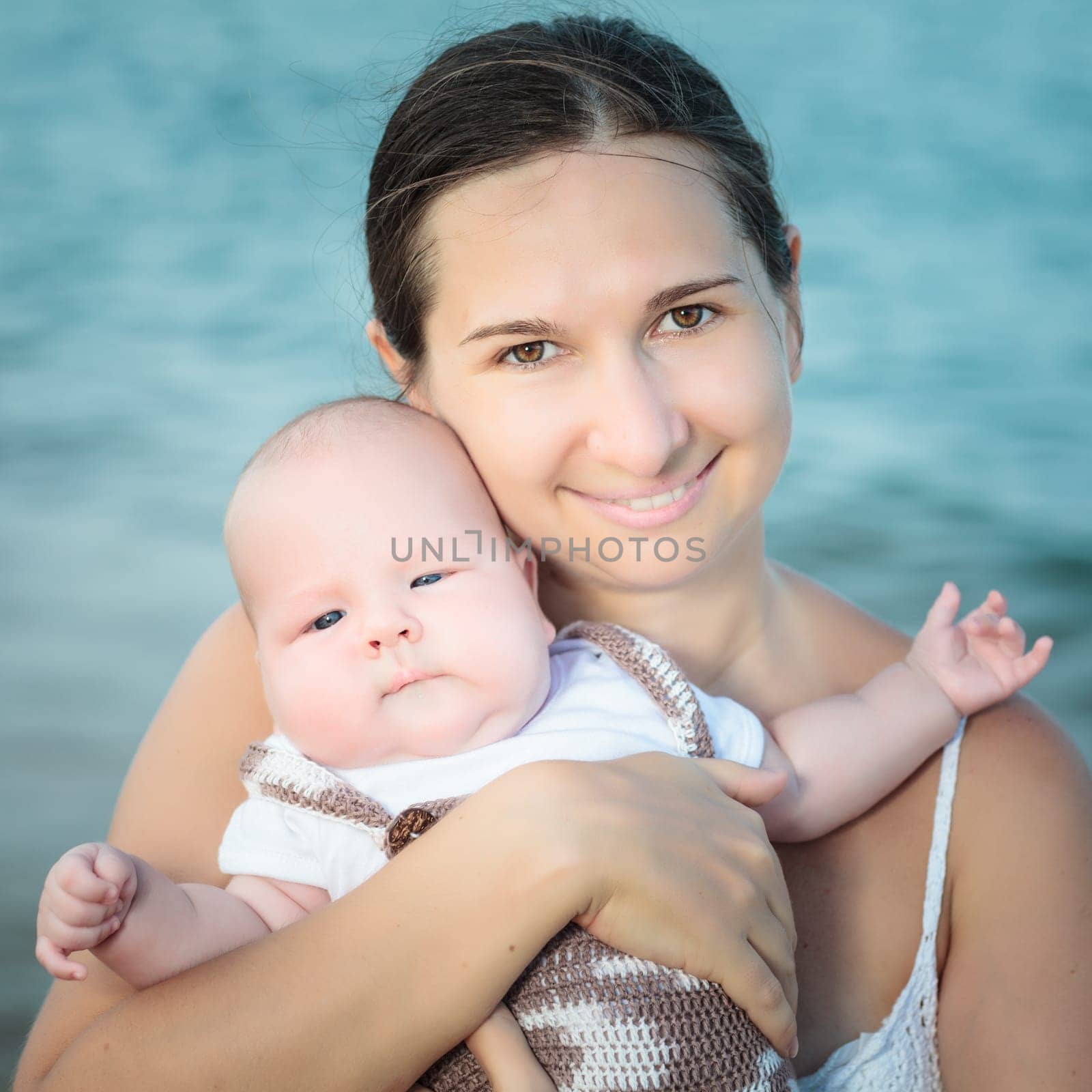 Baby and mom on the beach