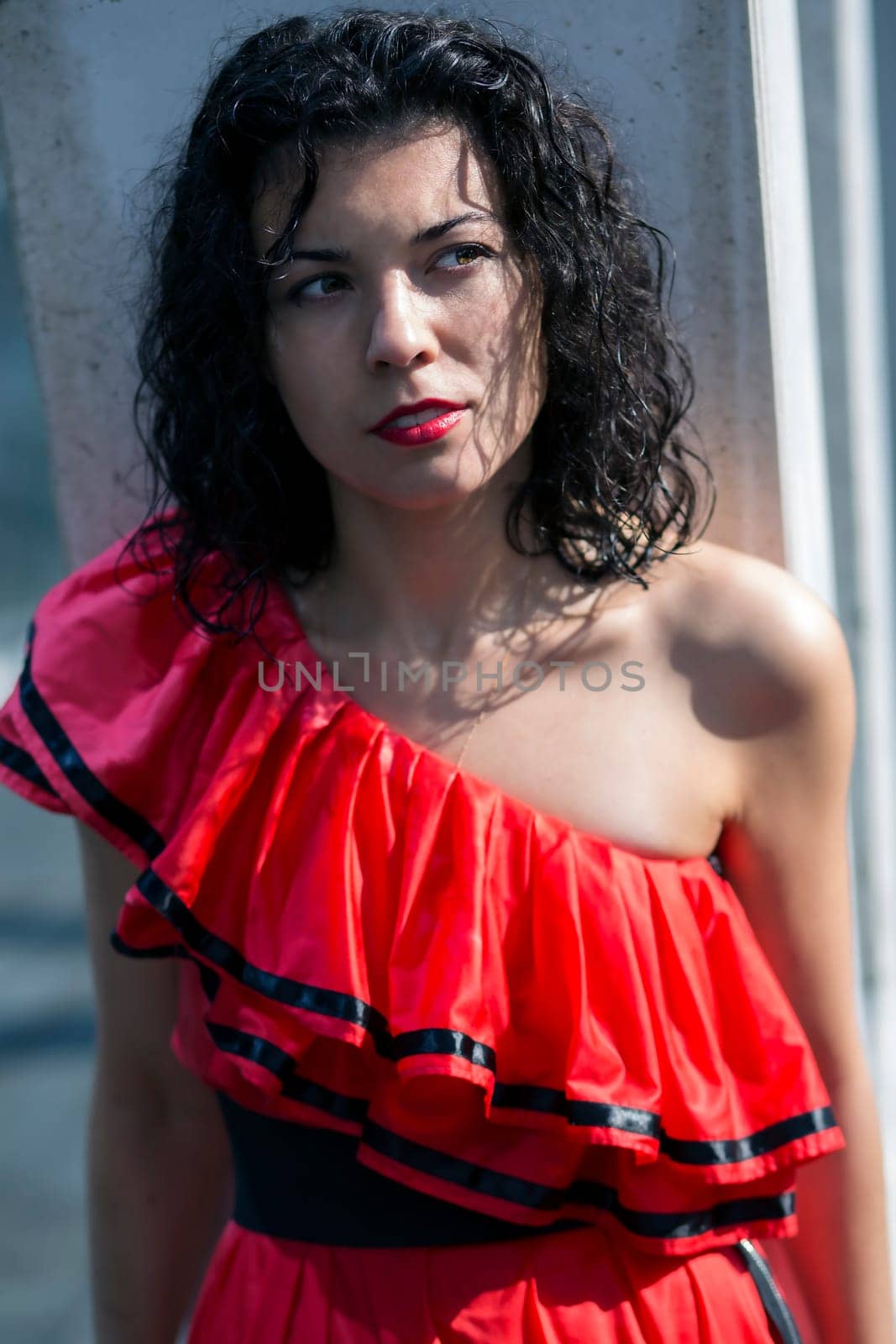 Zoomed face  of woman in soaking wet dress