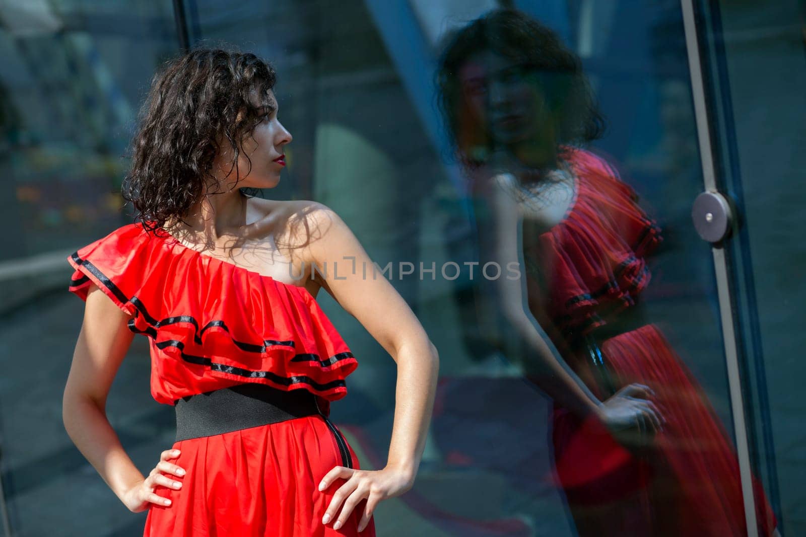 Zoomed woman in wet dress reflect at day