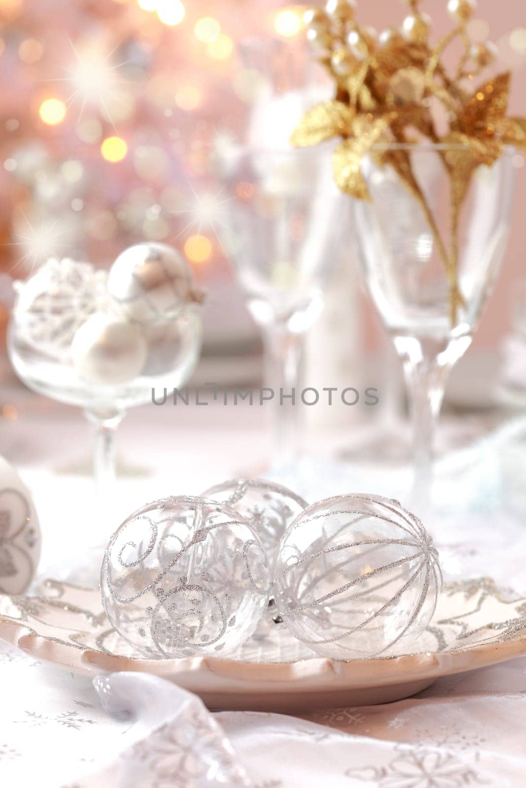 Decorated Christmas table with tree in background