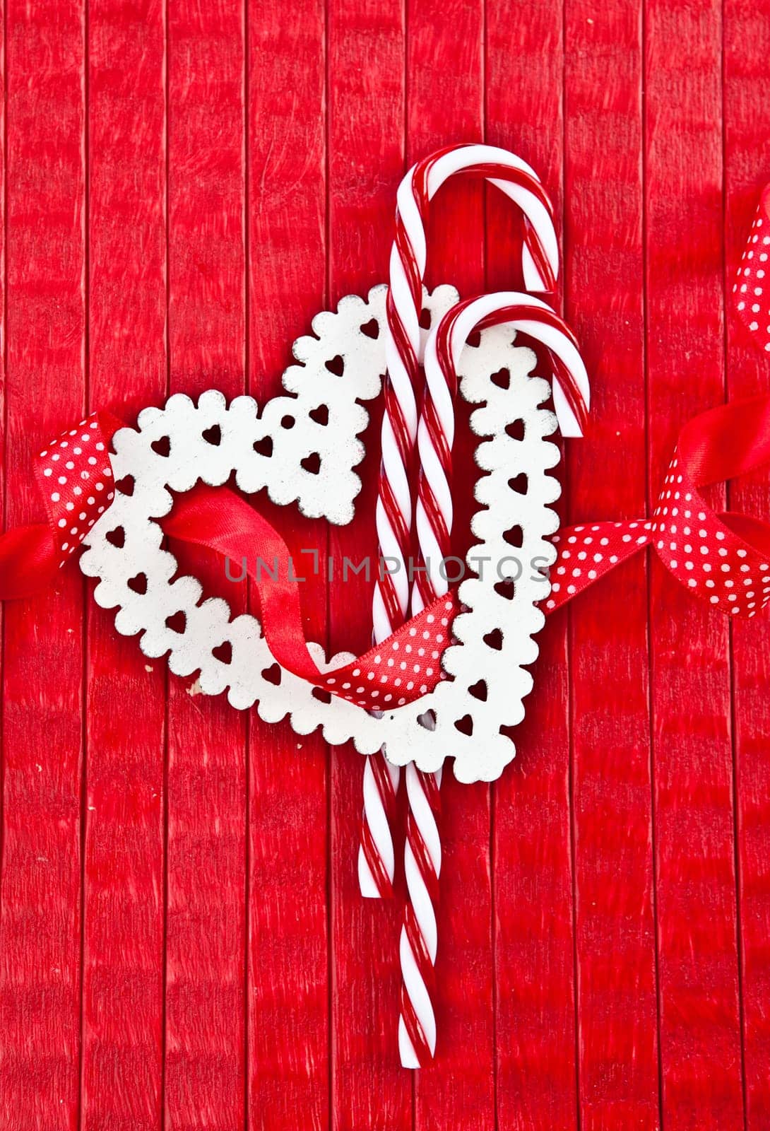 Red background with heart and candy canes