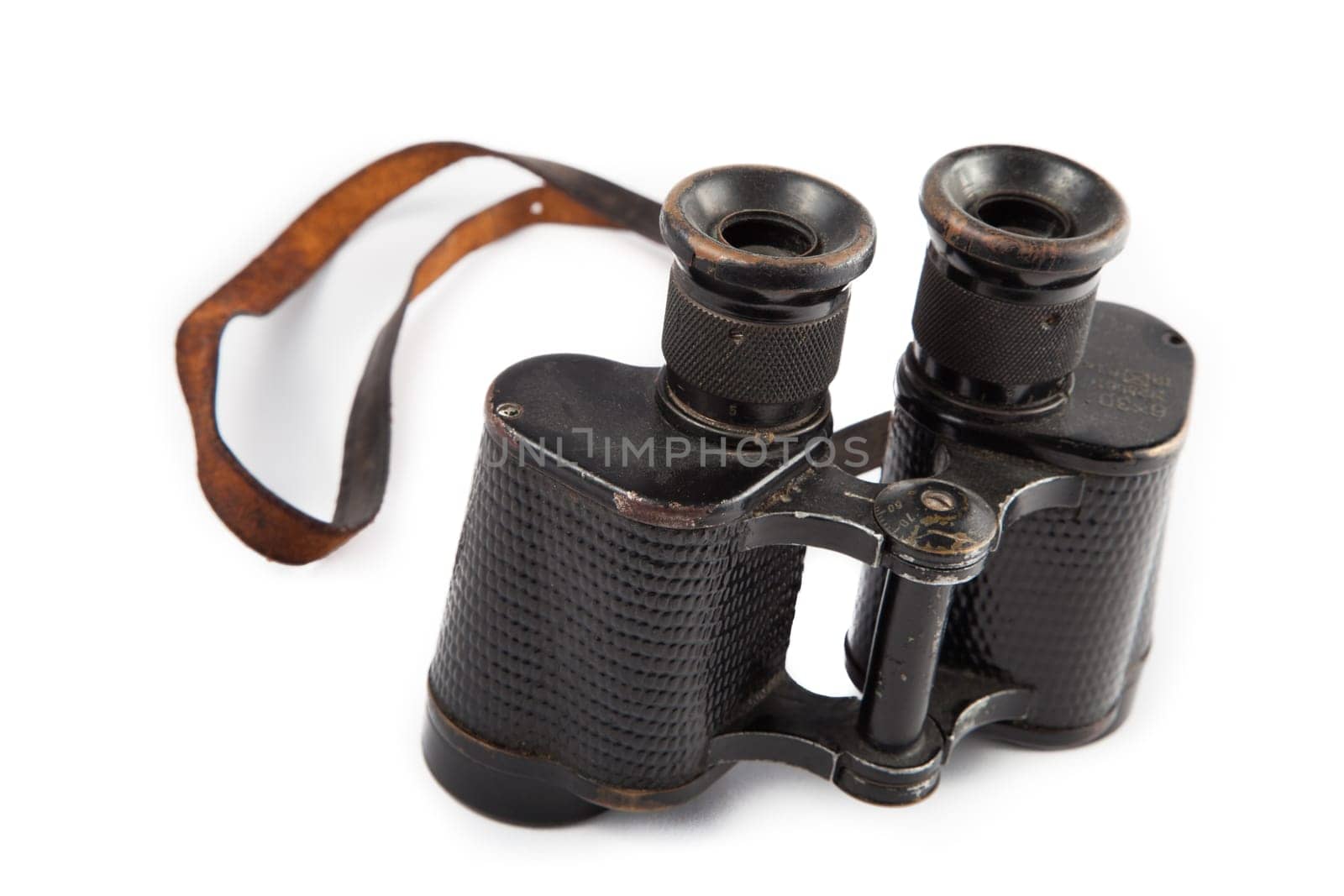 Black old military binoculars isolated on white
