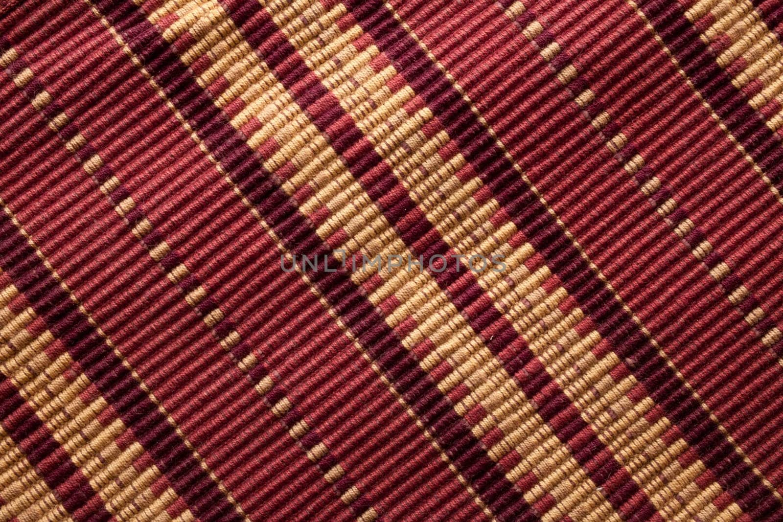 close up of warm colors striped fabric