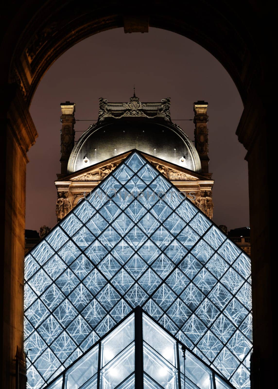 Louvre Museum in Paris, France by night