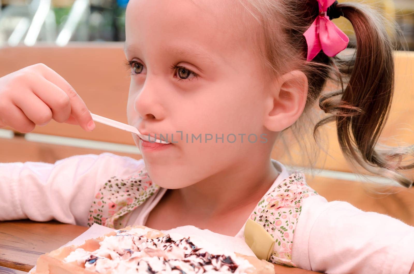 Little Girl Eating Waffles