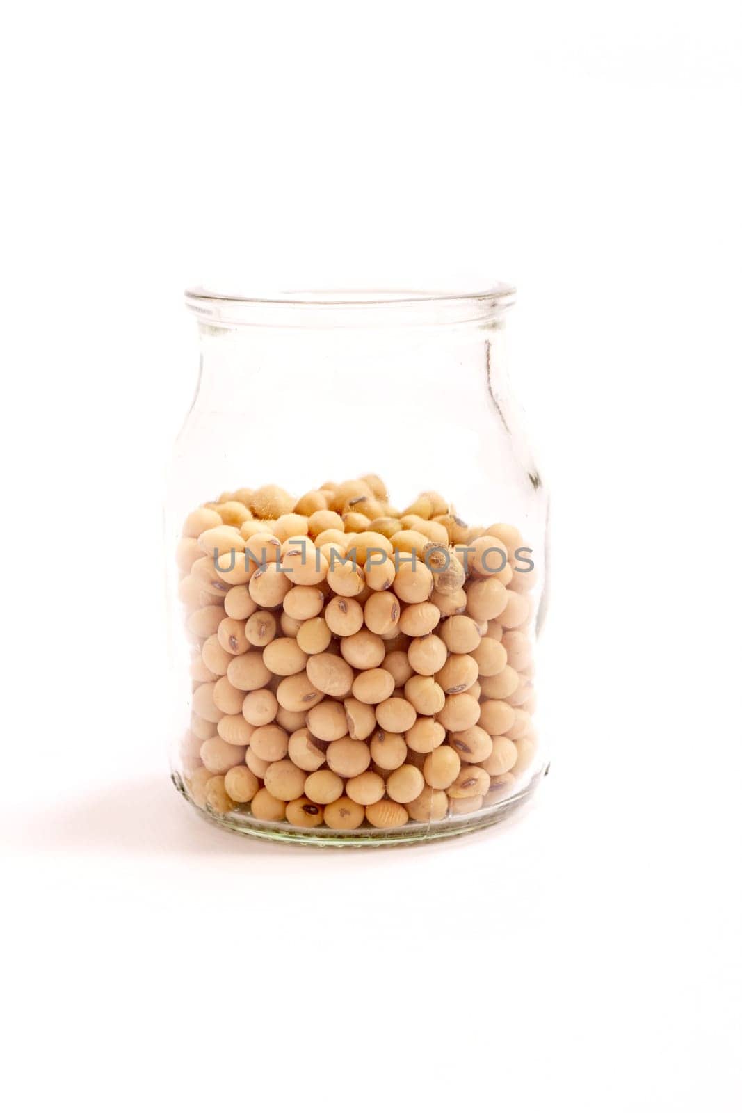 Lots of soybean in a glass pot.