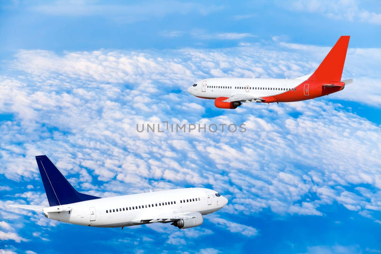 Airplane at fly on the sky with clouds