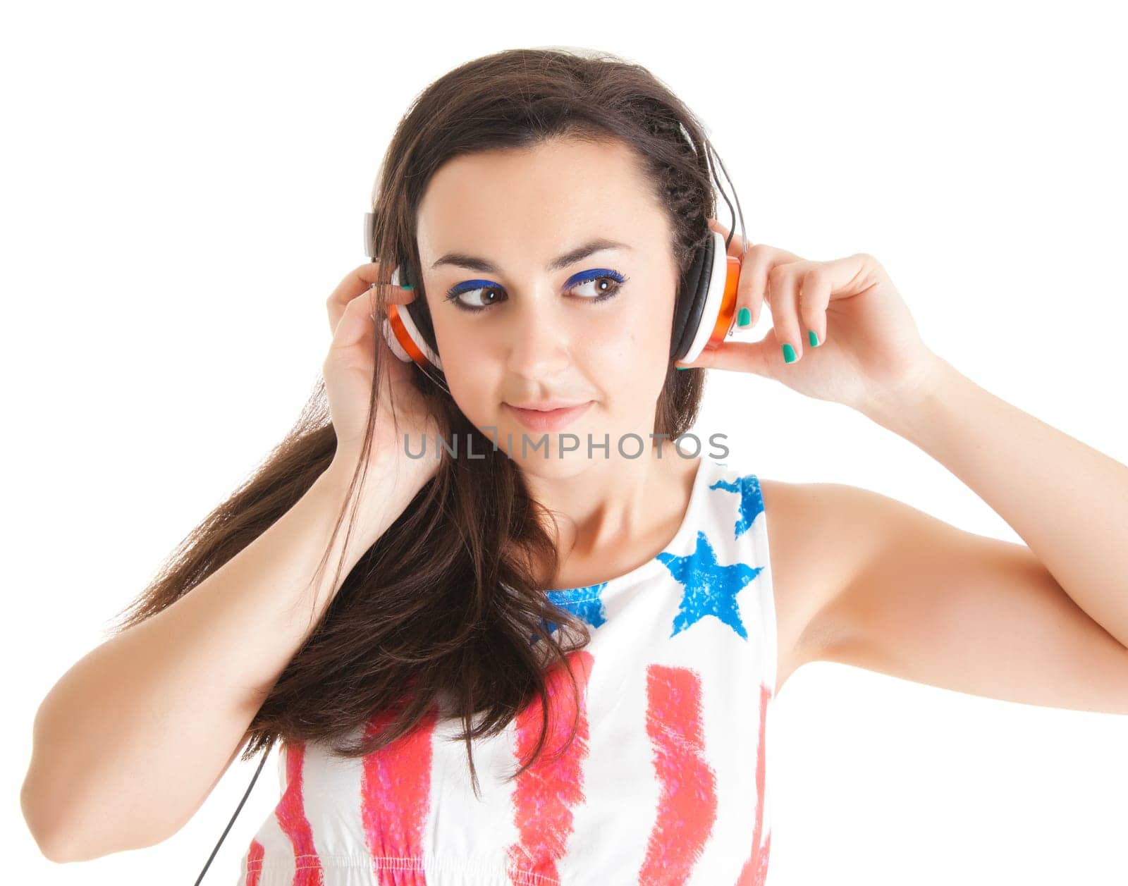 Young woman with headphones. girl listening to music in headphones