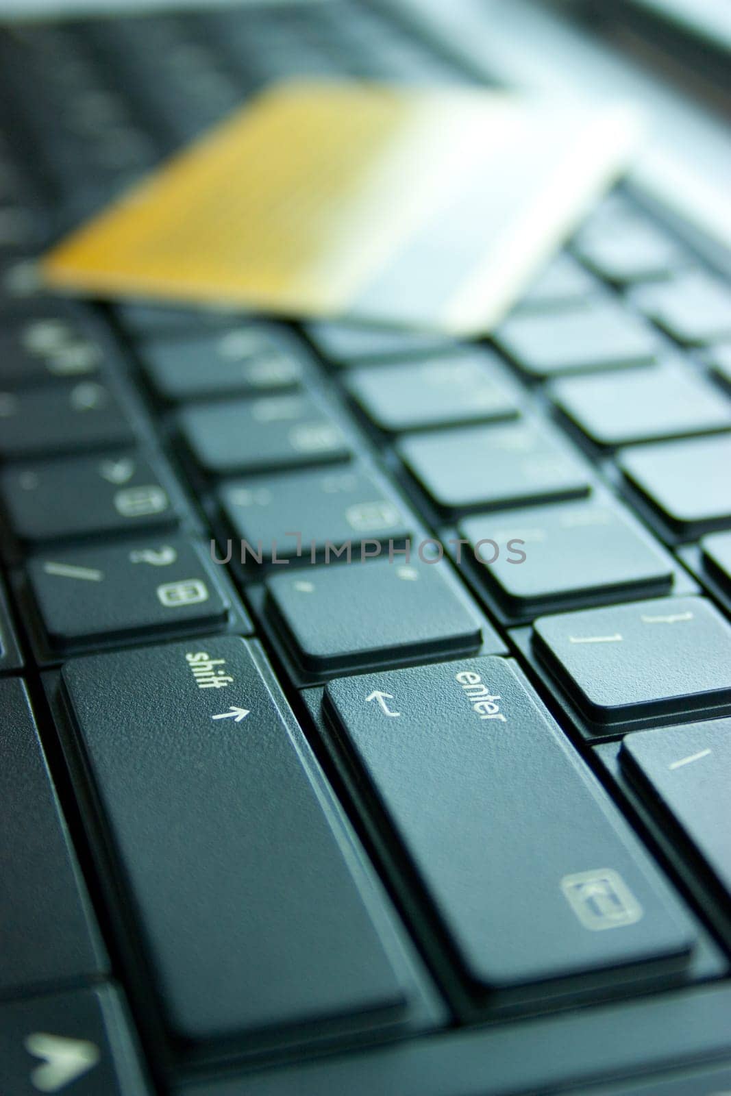 Credit card on computer keyboard