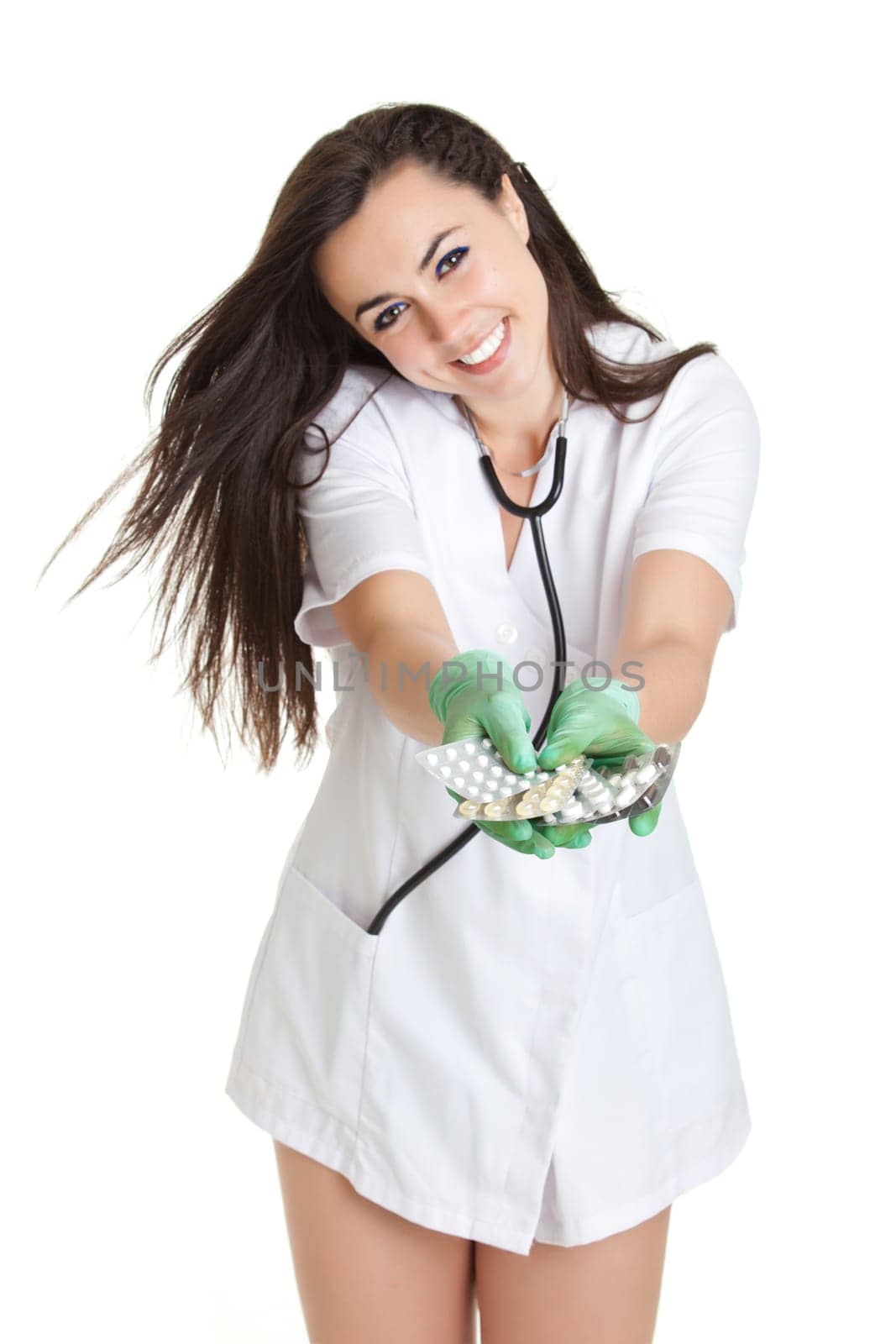 woman doctor with pills in hand. Female doctor holding many pills in her hands