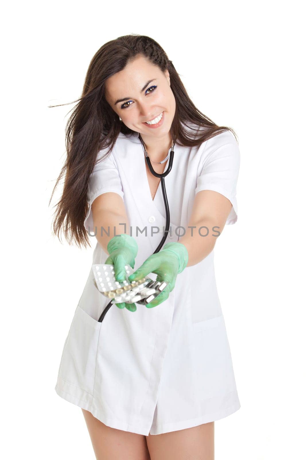 woman doctor with pills in hand. Female doctor holding many pills in her hands