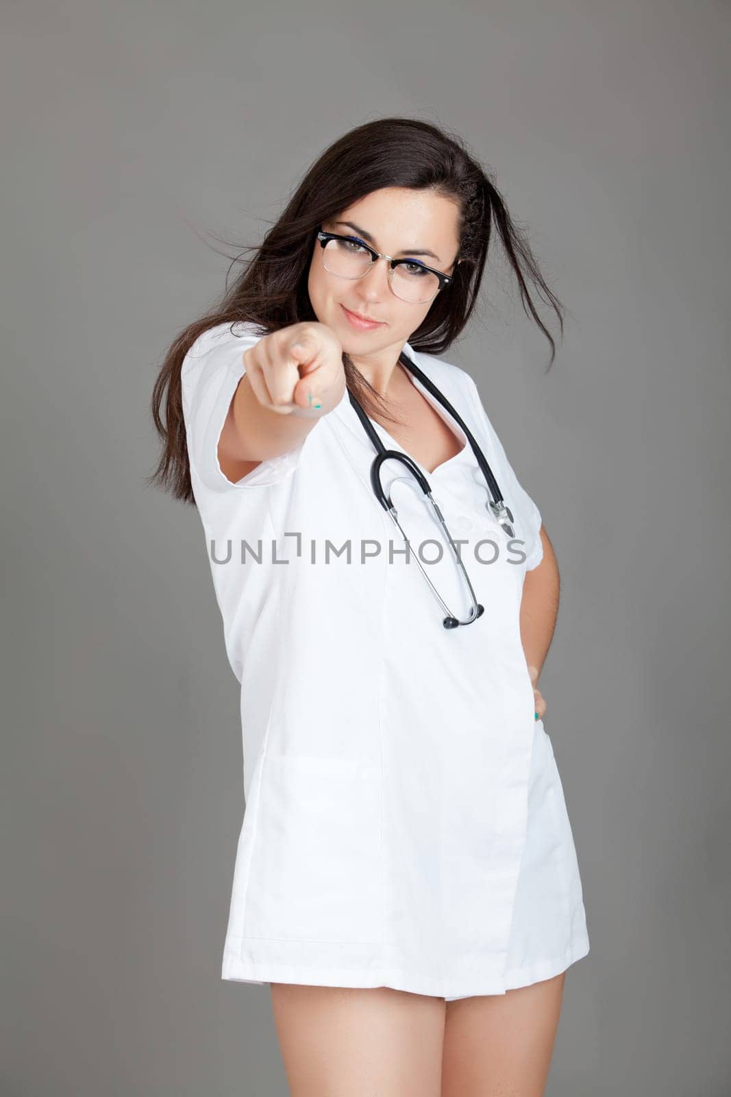 Portrait of a friendly female doctor. happy young smiling female doctor