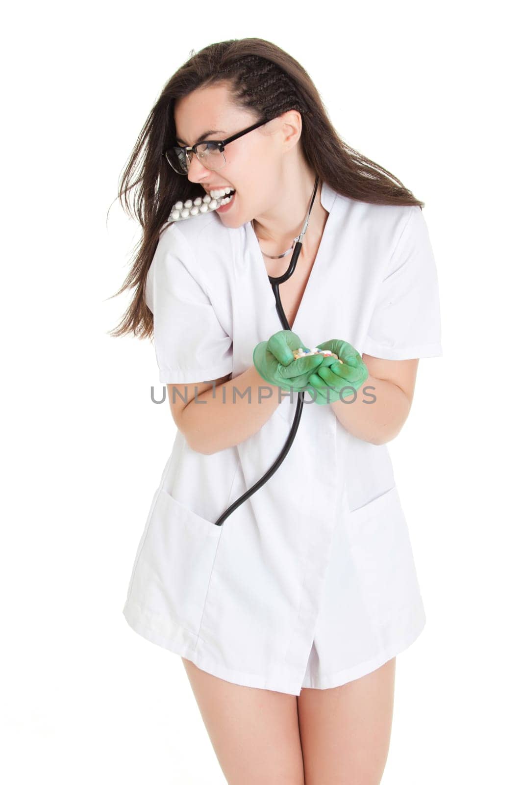 woman doctor with pills in hand. Female doctor holding many pills in her hands