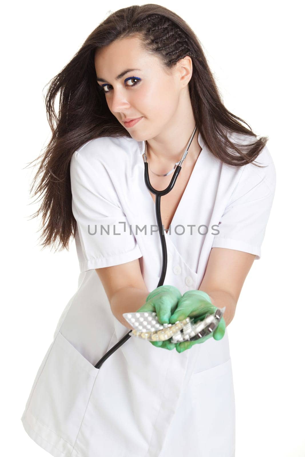 woman doctor with pills in hand. Female doctor holding many pills in her hands