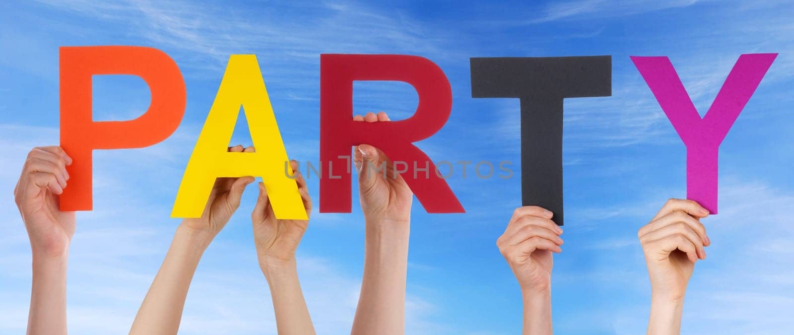 hands holding four pieces of a puzzle with copy space, gray background