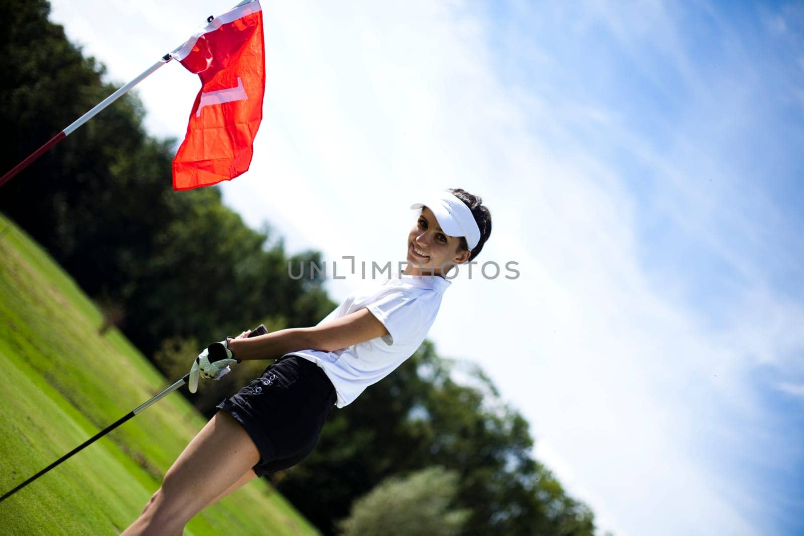 Woman playing golf