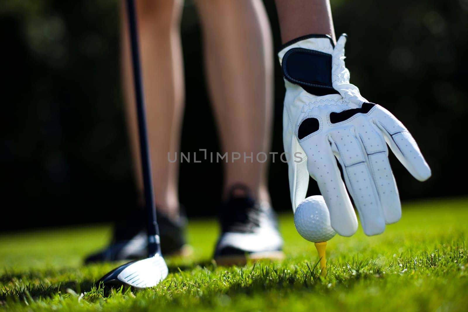 Playing golf, ball