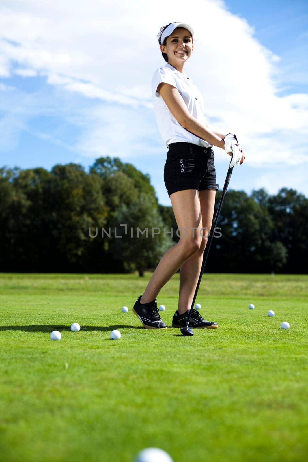 Playing golf, ball