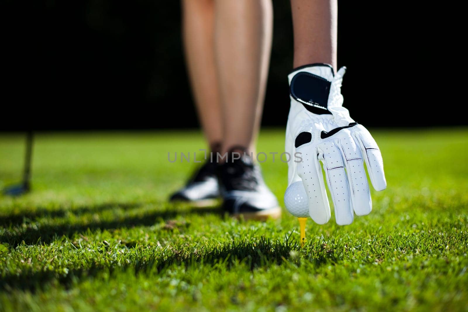 Playing golf, ball