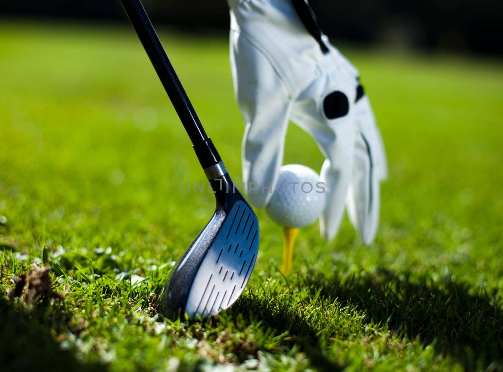 Playing golf, ball
