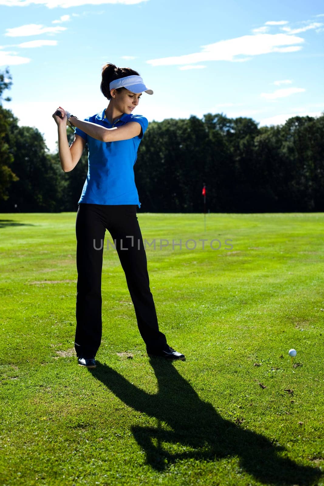 Woman playing golf