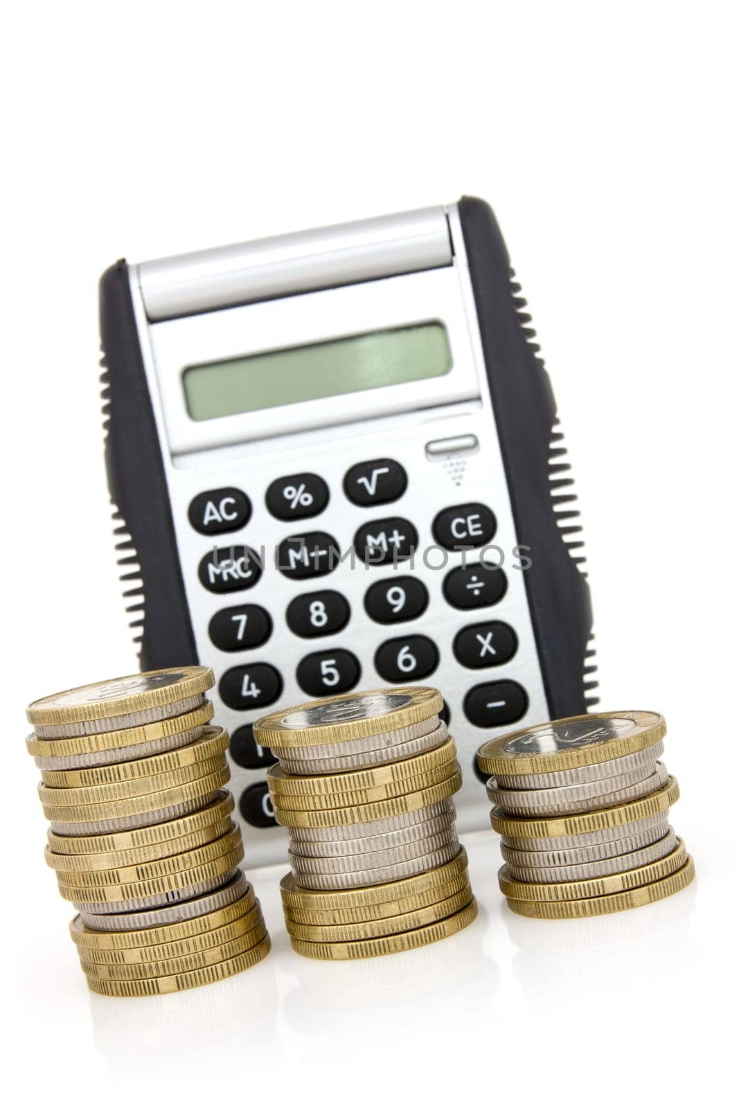 Stair of coins and calculator on white background