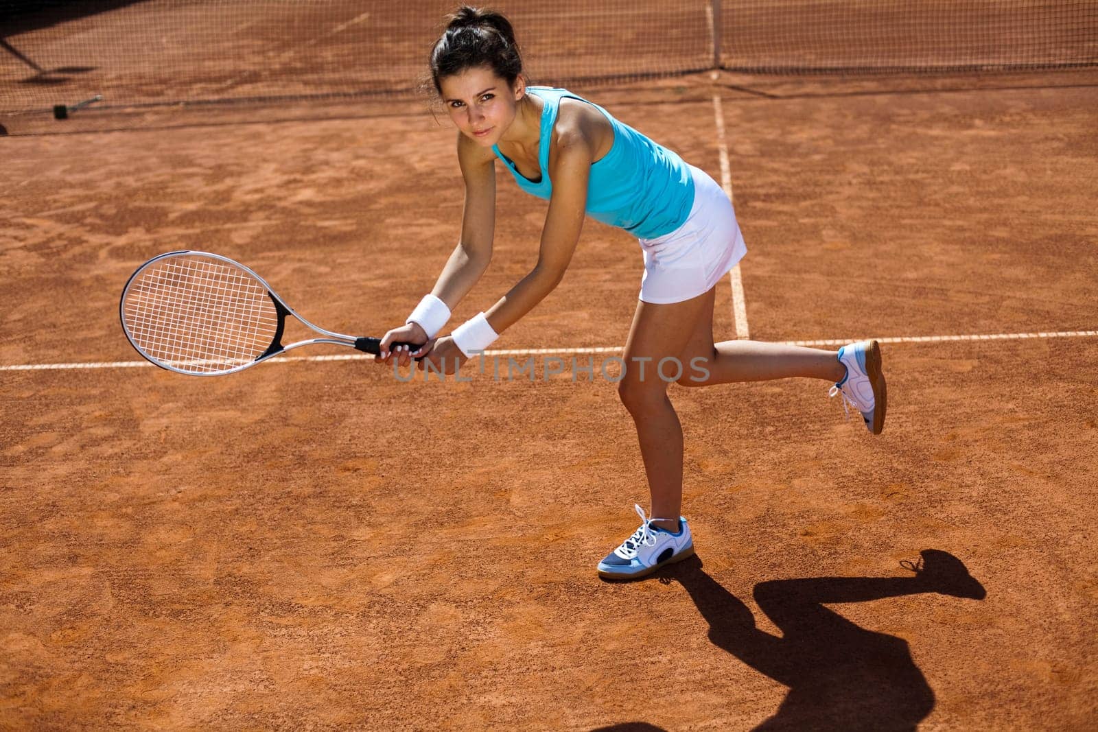Playing tennis