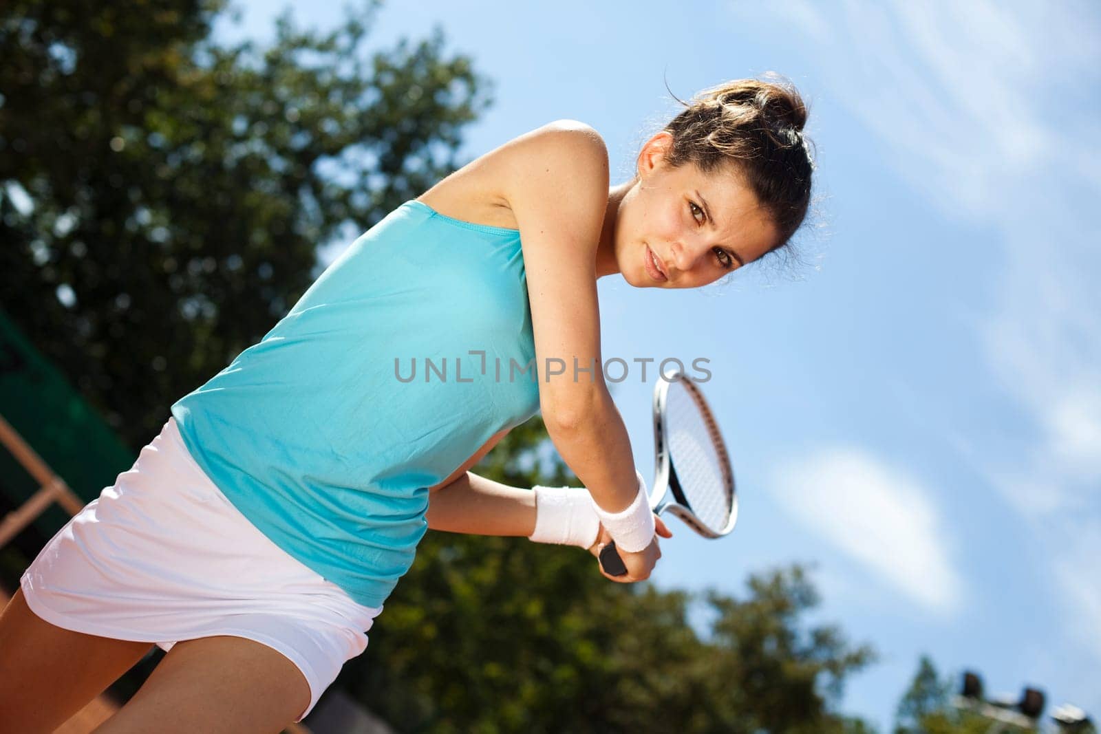 Girl playing tennis