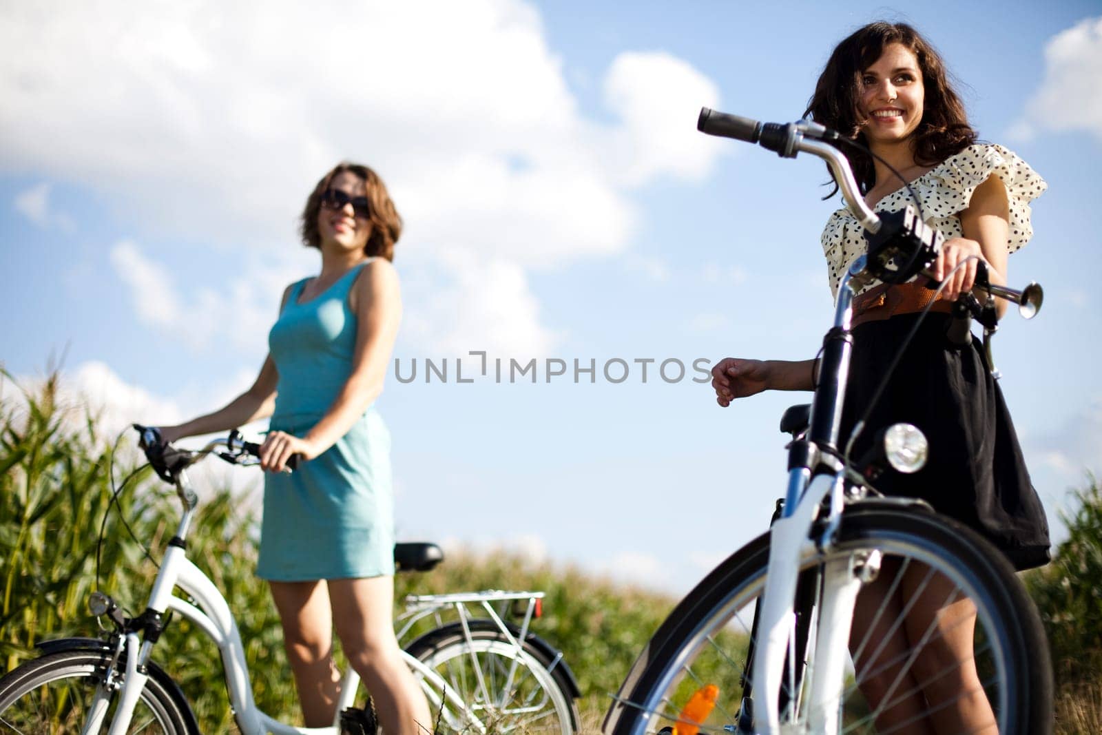 Girl with a bicycle enjoying