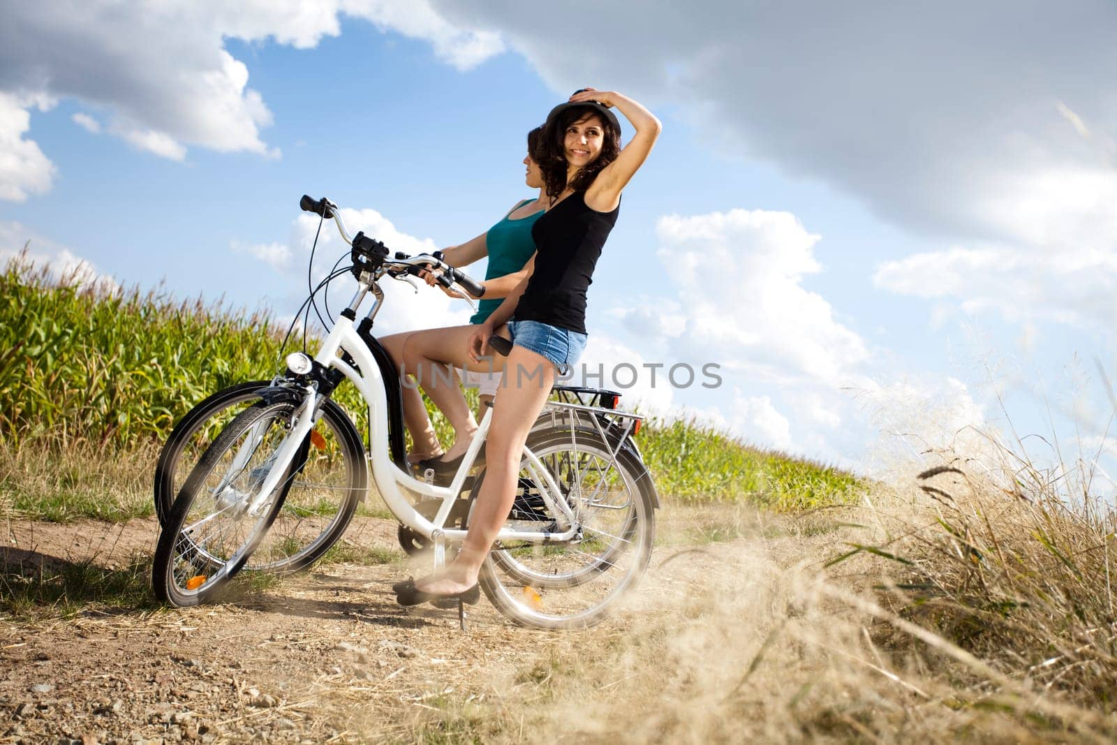 Girl with a bicycle enjoying