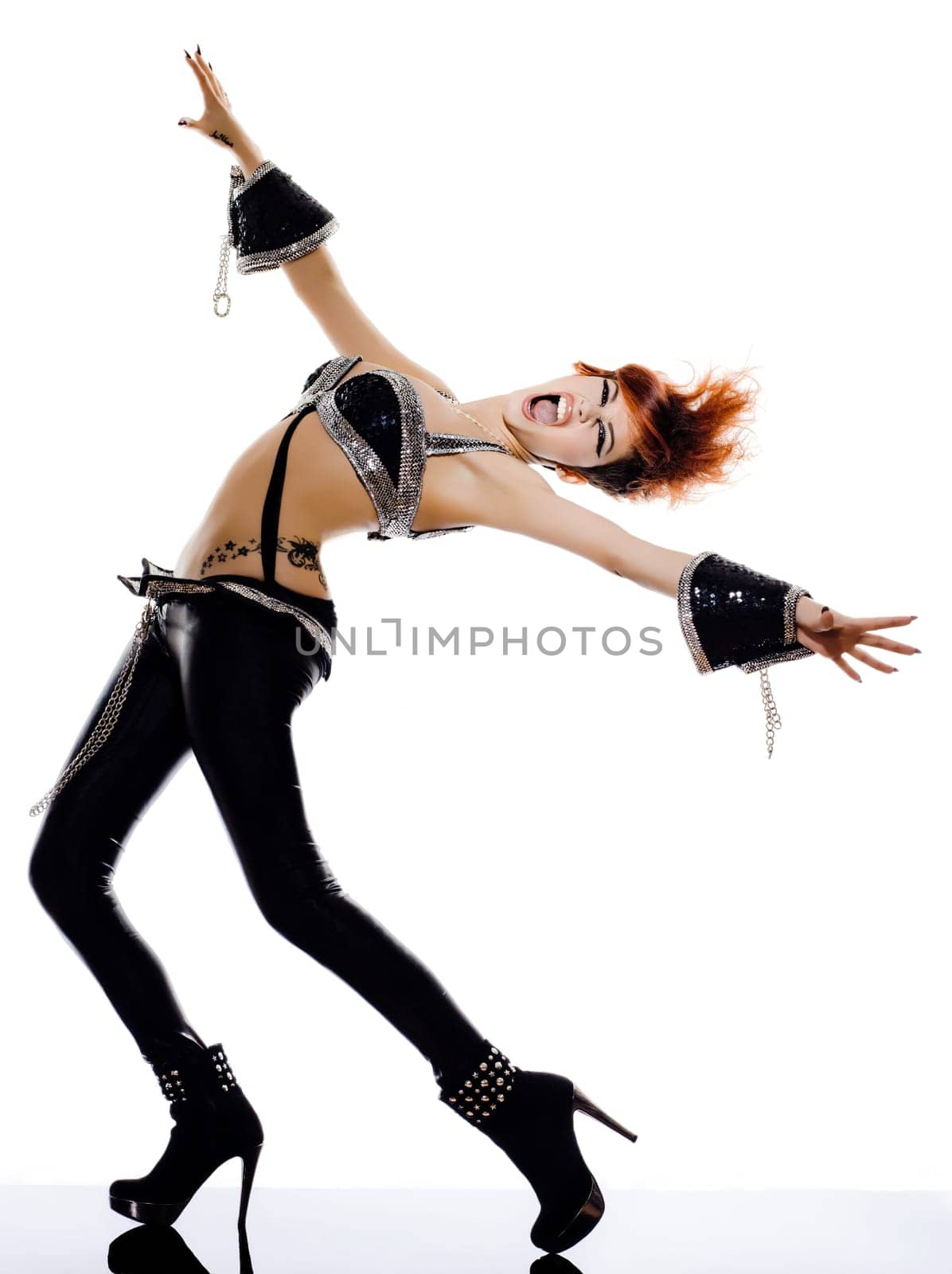 funky young woman in studio isolated on white background