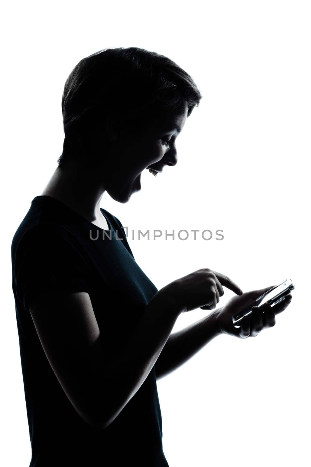 one caucasian young teenager silhouette girl telephone videophone video game  portrait in studio cut out isolated on white background