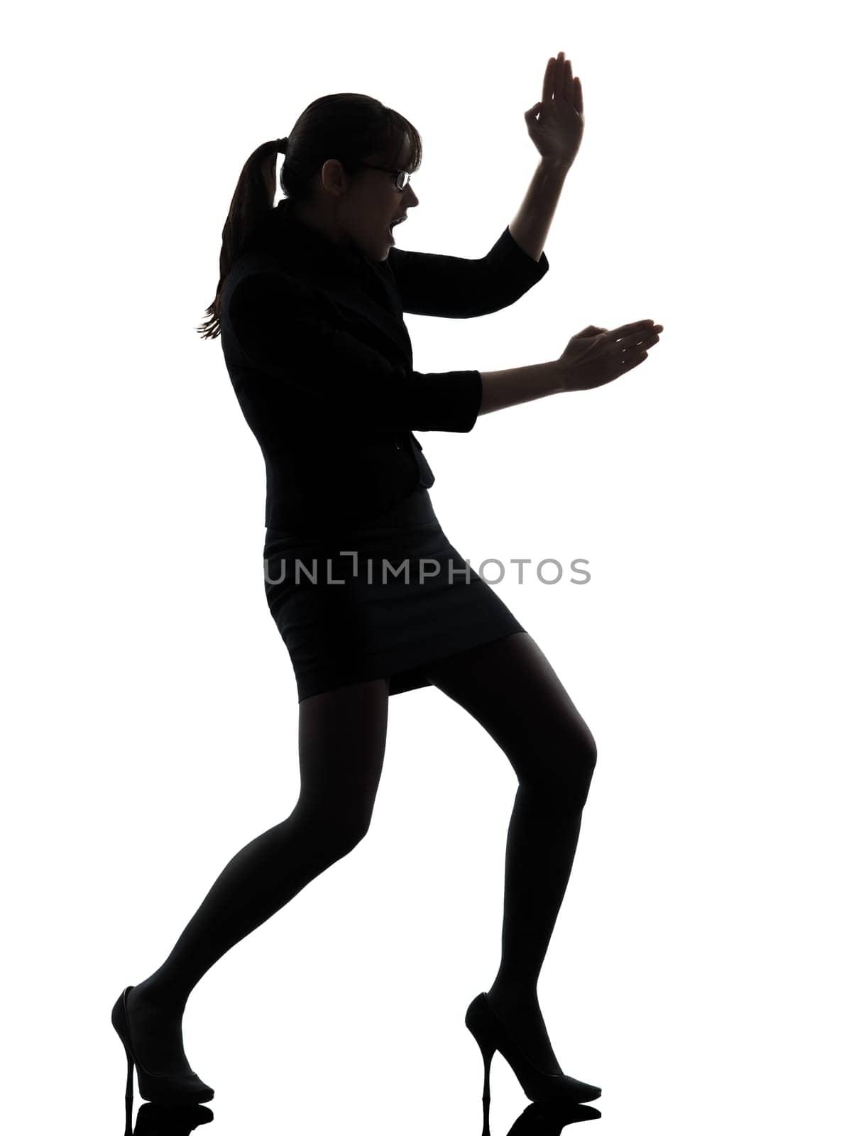 one business woman karate self defense  silhouette studio isolated on white background